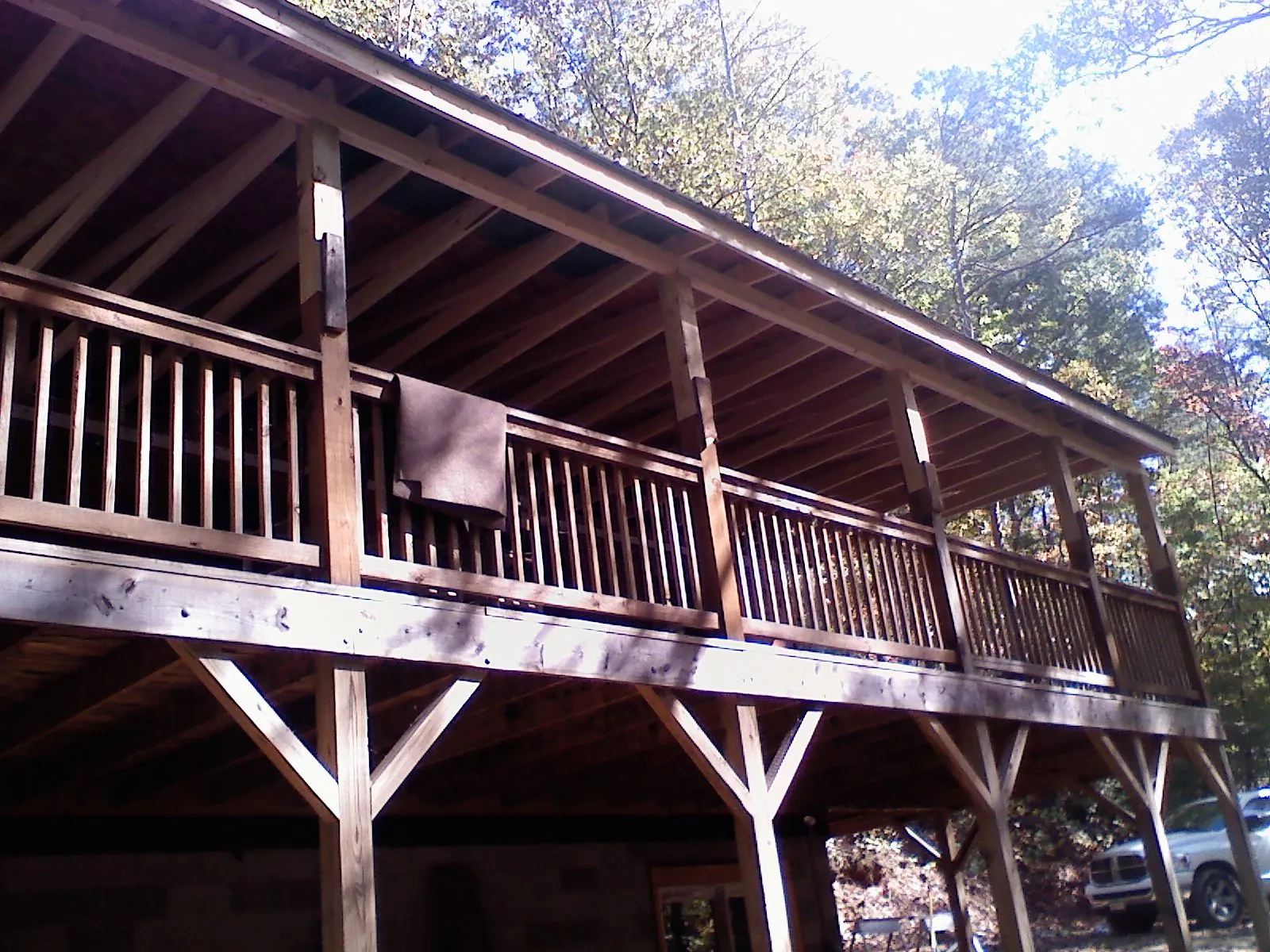 Timber framing under a new elevated porch and deck — Roof Leak Repair in Walnut Cove by Roofing Brothers